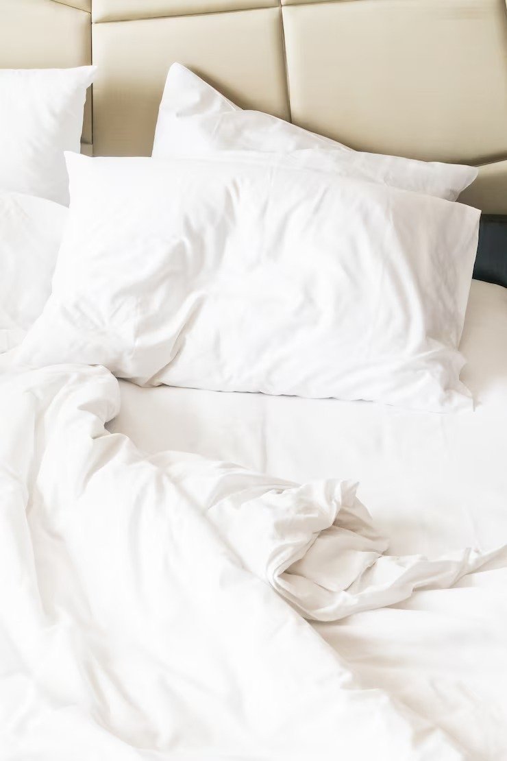Bed Rumpled Sheets
