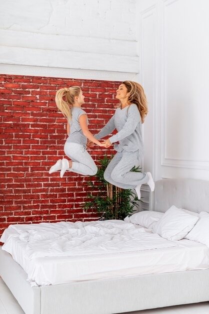 Bed Foams Happy Mother Daughter Jumping